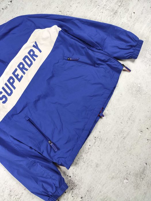 Kurtka wiatrówka Superdry niebieska męska jesienna anorak r. M