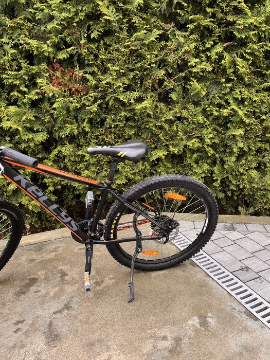 Rower kellys pomarańczowo czarny