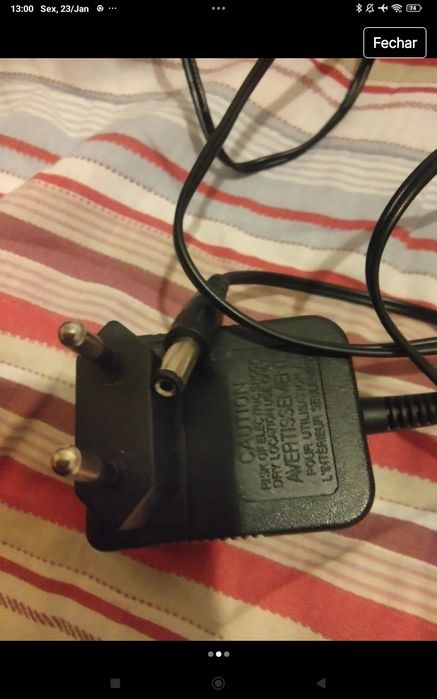 Carregador em bom estado
