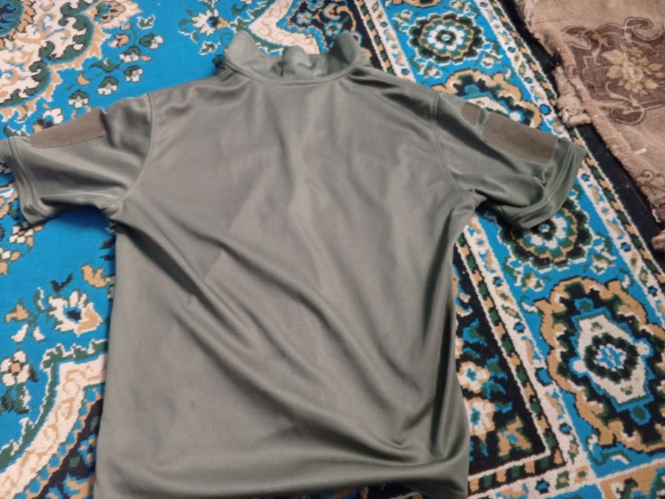 Поло  зсу в кольорі оливі розмір 48 50