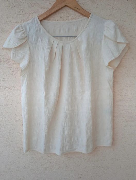 Blusa creme nova