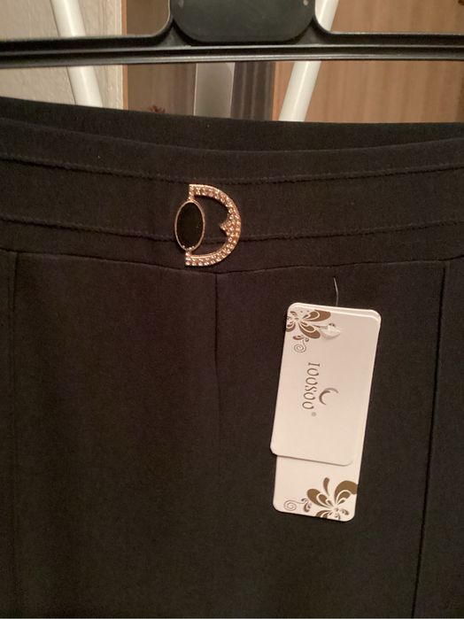 Czarne nowe, damskie spodnie .