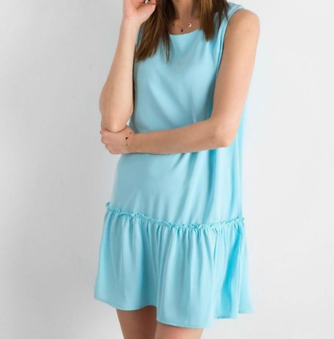 Błękitna sukienka z falbanką i wiązaniem na plecach - Nowa