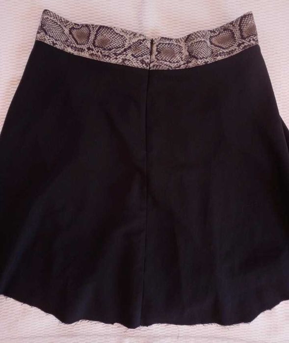 Mini saia padrão leopardo Zara