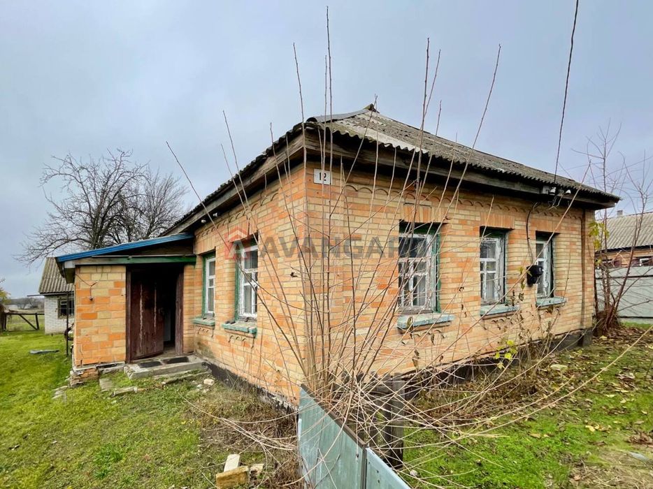 Ділянка 25 сотих з будинком в с. Худяки