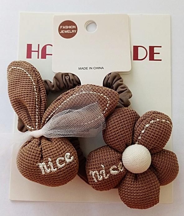 Zestaw 2 gumek dla dziewczynki, króliczek i kwiatek, brąz