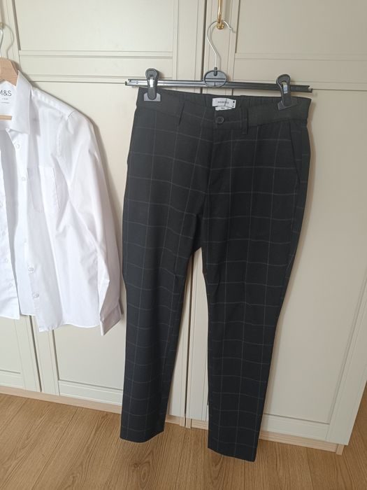 Biała koszula i eleganckie spodnie 164