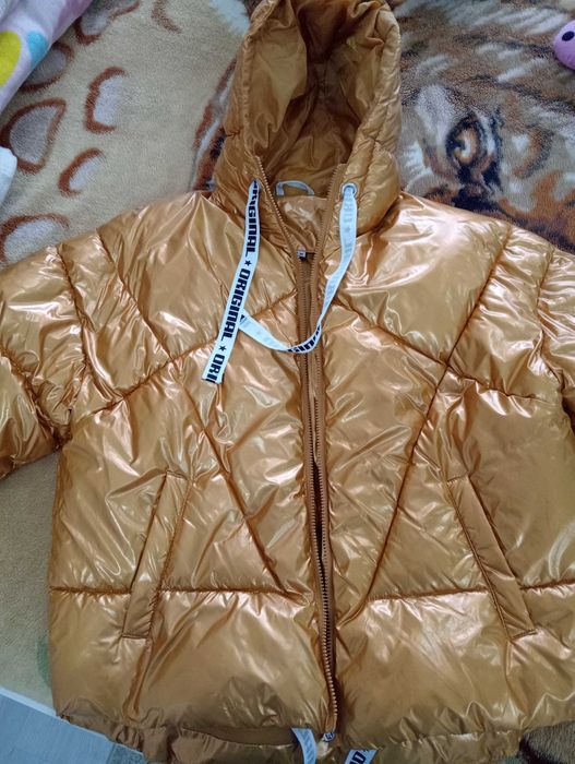 Kispo dourado de mulher