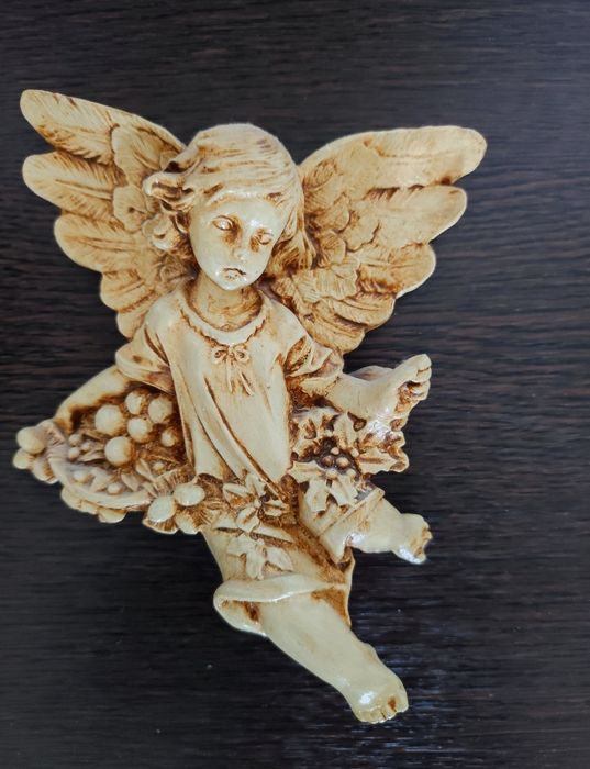 Conjunto de anjos em marfinite