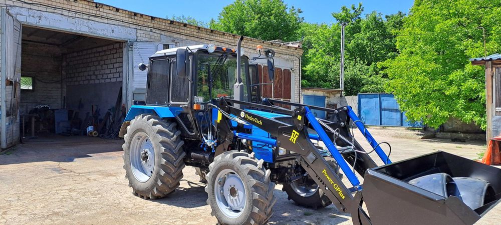 Быстросйомный фронтальный погрузчик кун Юмз