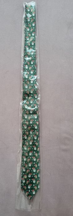 Męski krawat we wzorki ze św Mikołajem SANTA