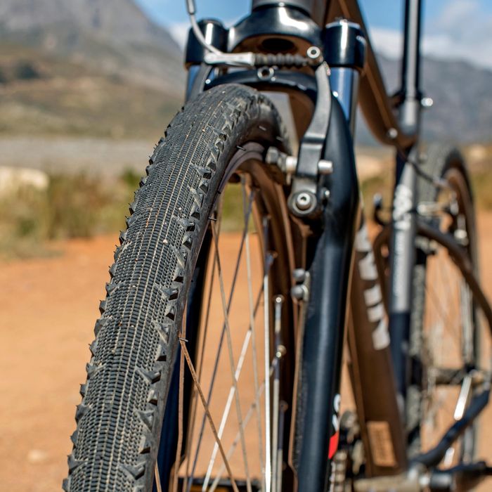 BICICLETA TREKKING RIVERSIDE 500 CINZENTO/VERMELHO