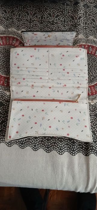 Mala e carteiras prafois