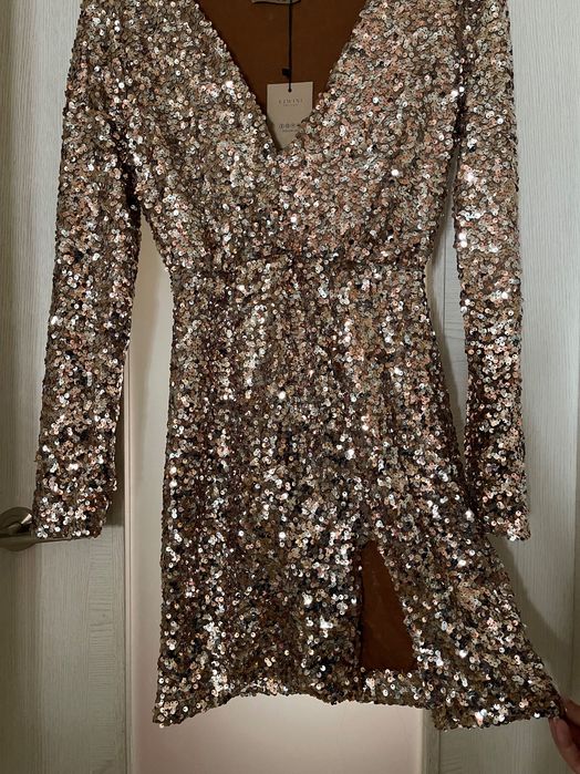 Vestido de lantejoulas dourado