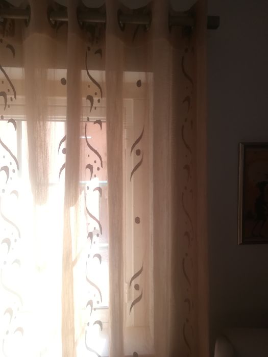 Conjunto de cortinados com argolas