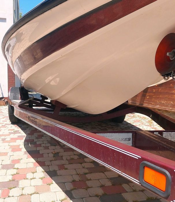 Лодка Triton TR21 + Лафет + Mercury 225 EFI Америка човен