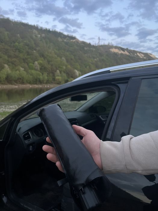Сонцезахисна парасолька в авто