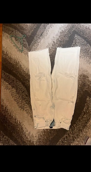 Spodnie baggy jeans z dziurami