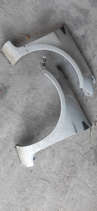 Peças Clio III para-choque / guarda lamas