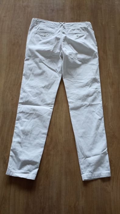 Męskie bawełniane jasne spodnie Tommy Hilfiger rozmiar 32/32