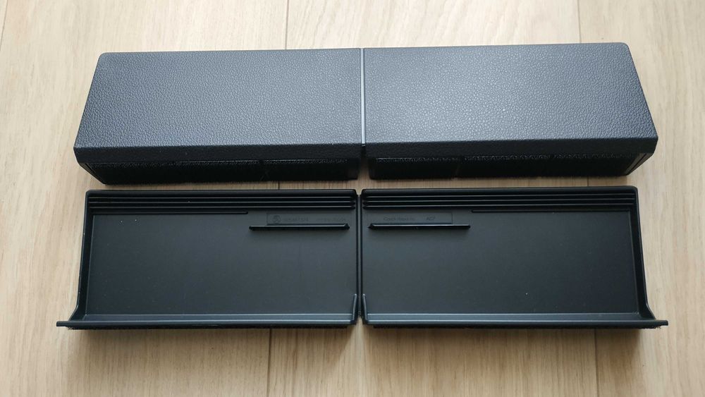 System mocowania kartonów w bagażniku