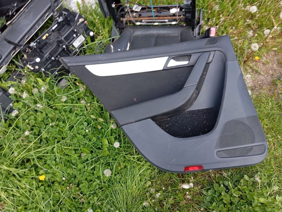 Boczek tapicerka drzwi tył lewy Volkswagen Passat B7 Sedan