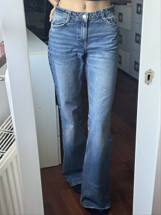 Flared jeansy dzwony niebieskie Bershka 32
