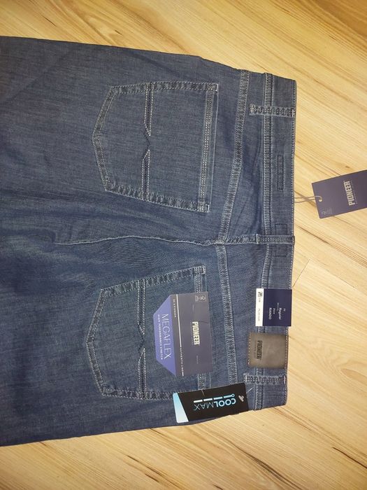 Nowe spodnie jeansowe  rozm.35/34