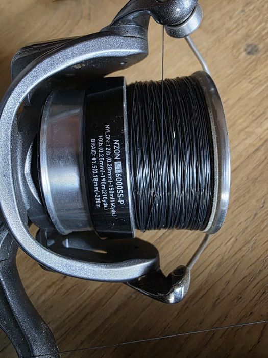Daiwa n-zon wraz z kołowrotkami i pokrowcem