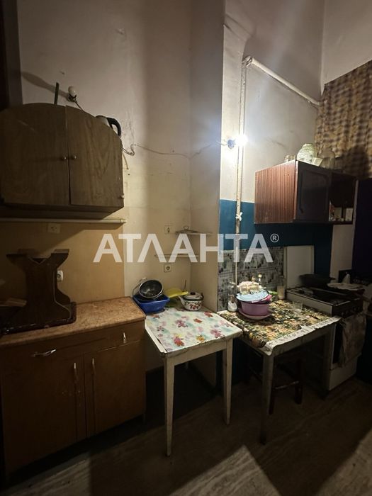 Продам двухуровневую комнату  в центре
