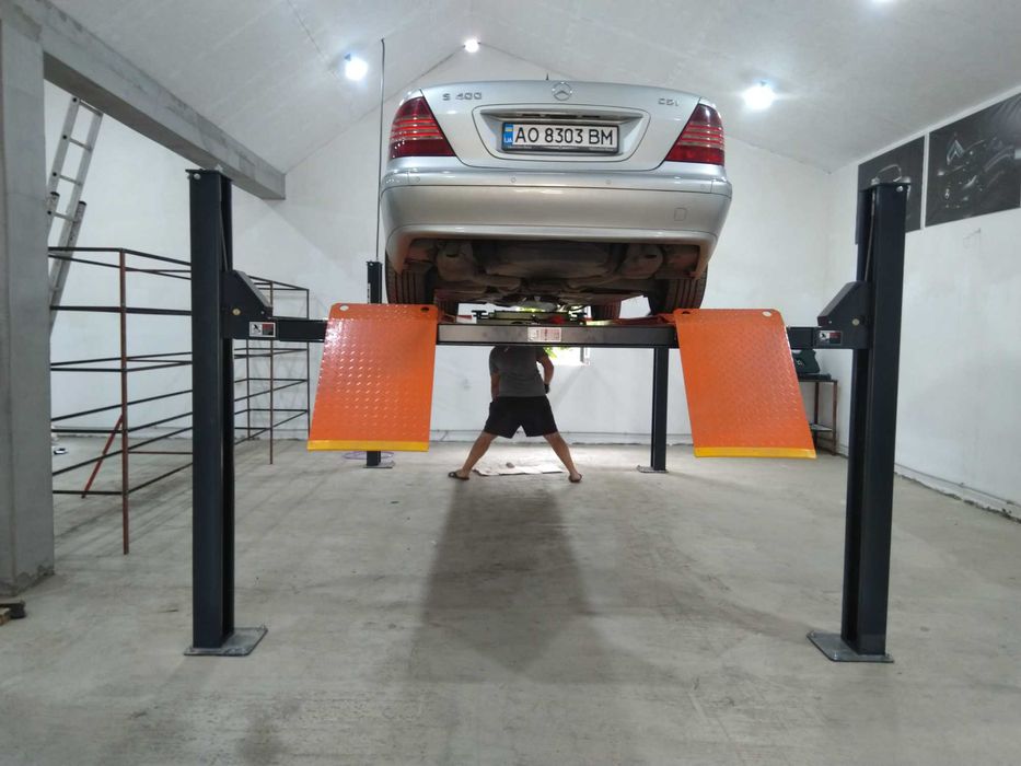 четырехстоичный подъемник для ремонта и для развала-схождения