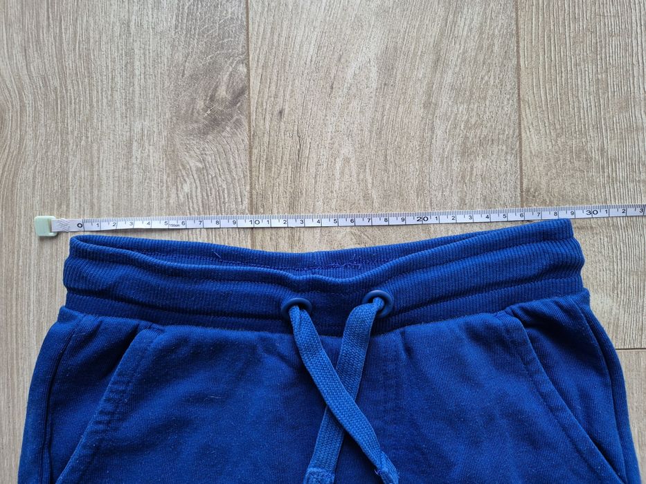 Jak nowe! Spodnie dresowe dziecięce, Cool Club, c. niebieskie, r 128