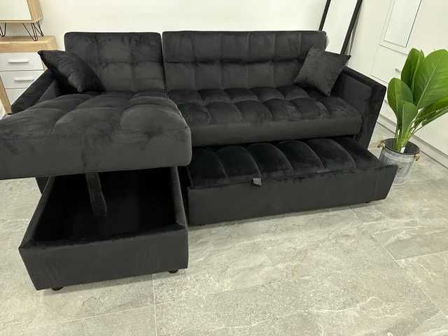 sofá-cama preto de veludo com espaço de arrumação