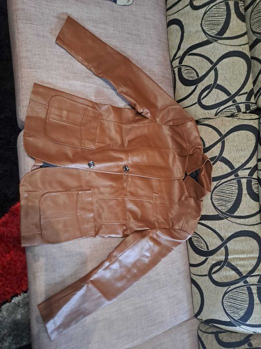 Casacos em pele sintético novos