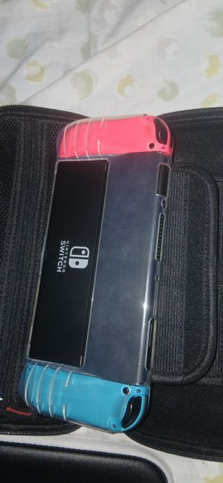 Nintendo Switch OLED (Como Nova) + Garantia + EA Sports FC 25 + Extras