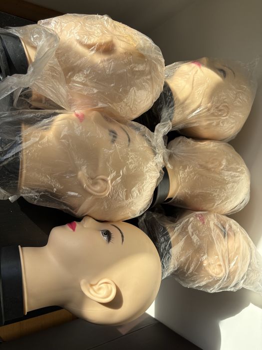 Cabeças de manequim feminino