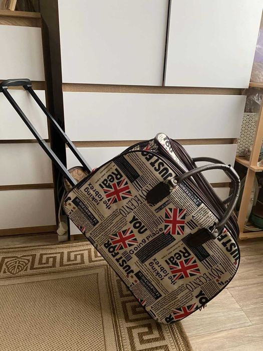 Дорожня сумка на колісах