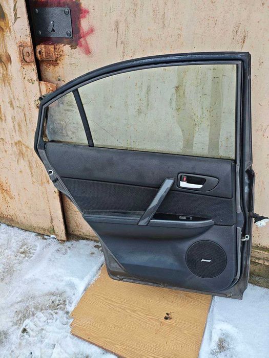 Mazda 6  хечбек дверь левая задняя