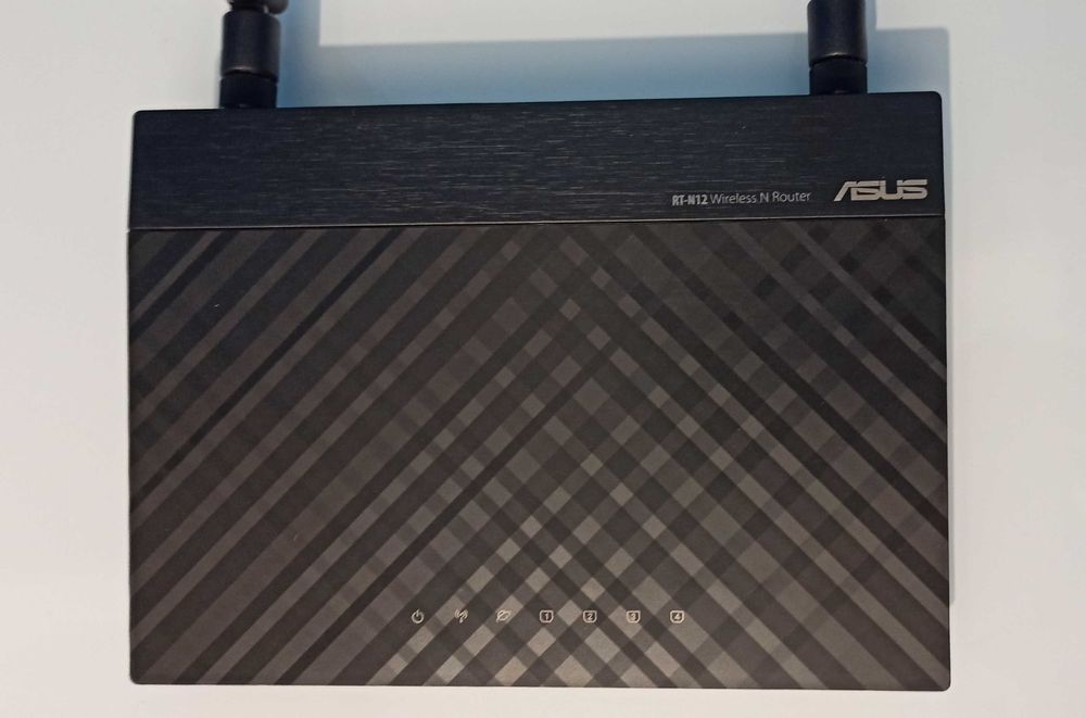 WI-FI роутер ASUS RT-N12 300 Мбит/с: 430 грн. - Периферійні пристрої ...