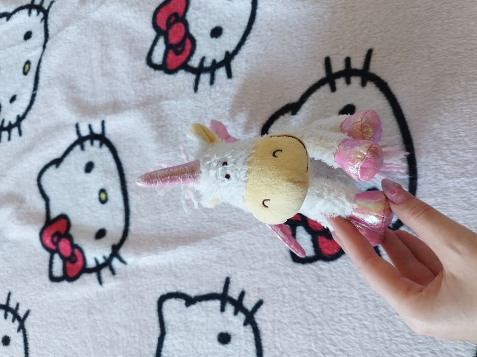 Pluszowy jednorożec z kieszonką