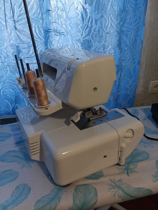 Оверлок Jaguar GT 970 новый