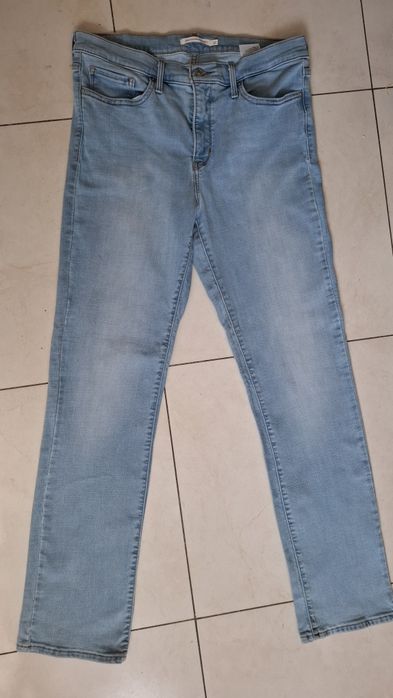 Nowe spodnie jeansowe "LEVI STRAUSS & CO" rozm. 32