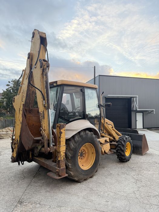 Retroescavadora newholland nh85