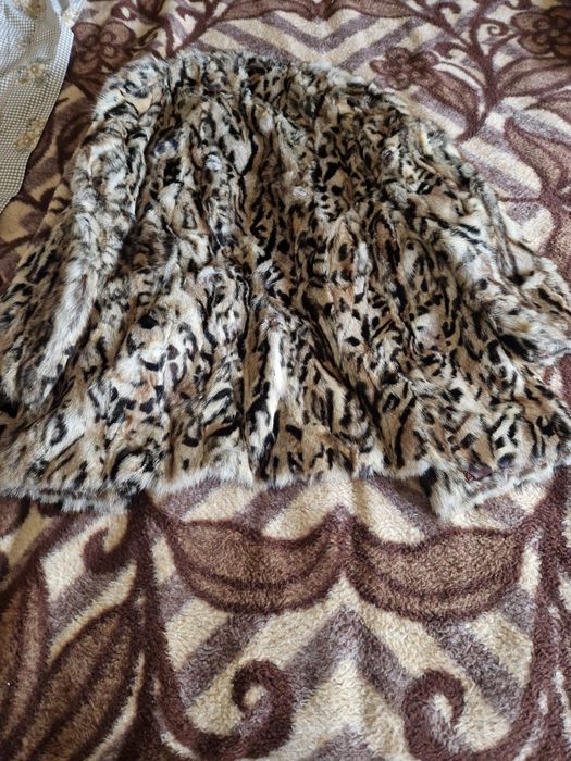 Casaco em pêlo padrão leopardo