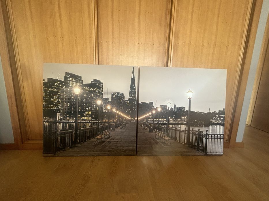 2 quadros com imagem cidade e ponte