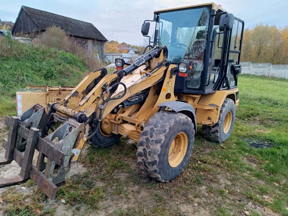 Фронтальний навантажувач CAT 906