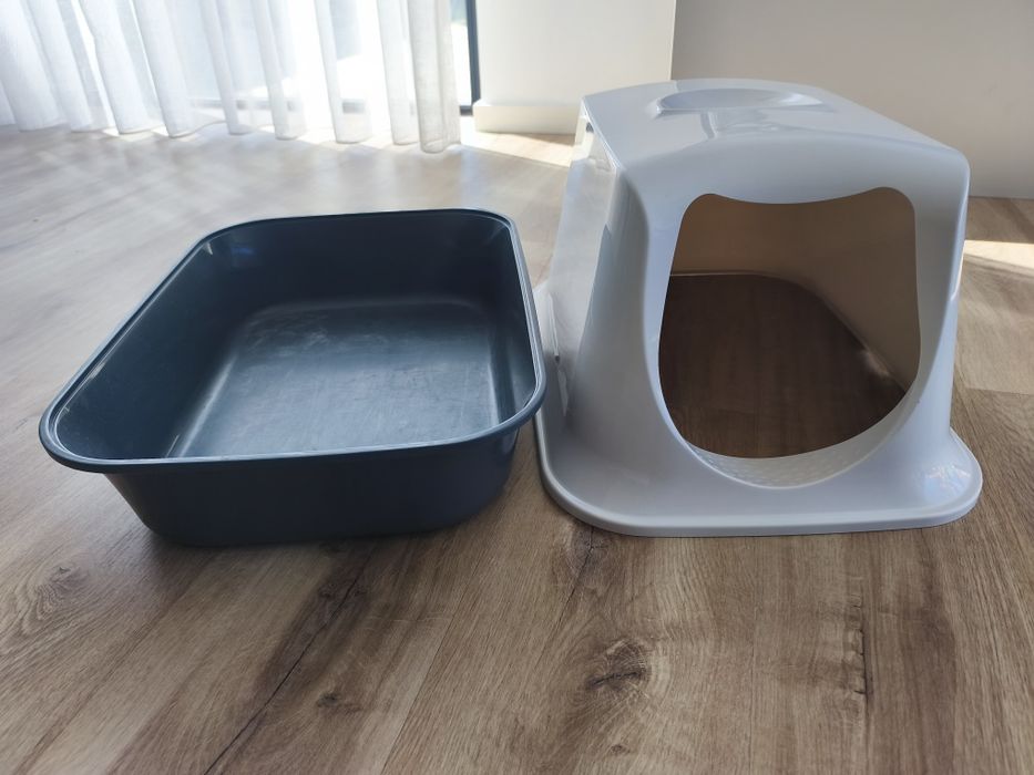 Cama e caixa de areia para gatos