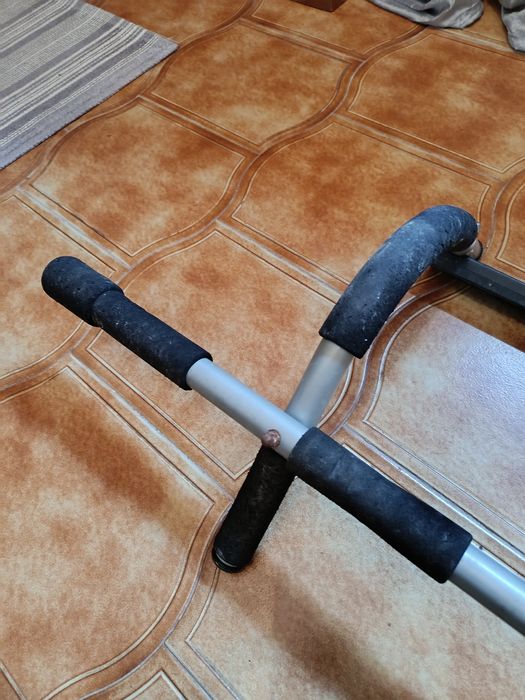 Barra de elevação para porta