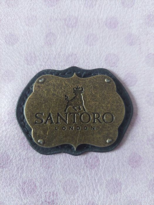 Mala de tiracolo,  Santoro