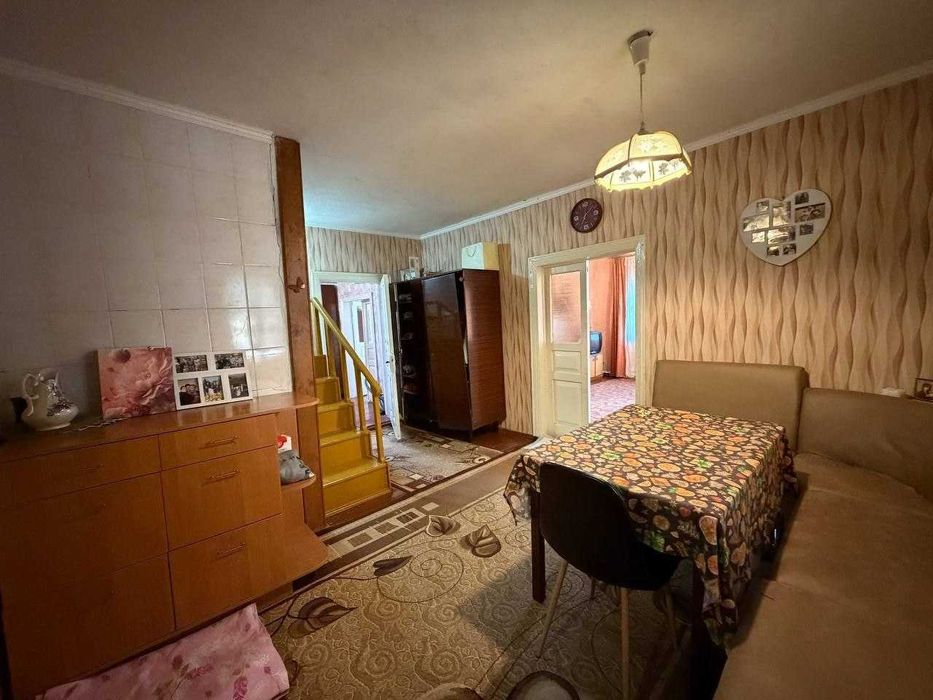Затишний будинок та 33 сотки землі в межах міста